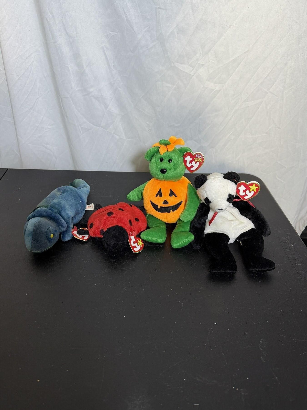 Lot of 4 Ty Beanie Babies: Pumkin, Lucky, Panda, Manny Plush Toys - Wormhole Thrift