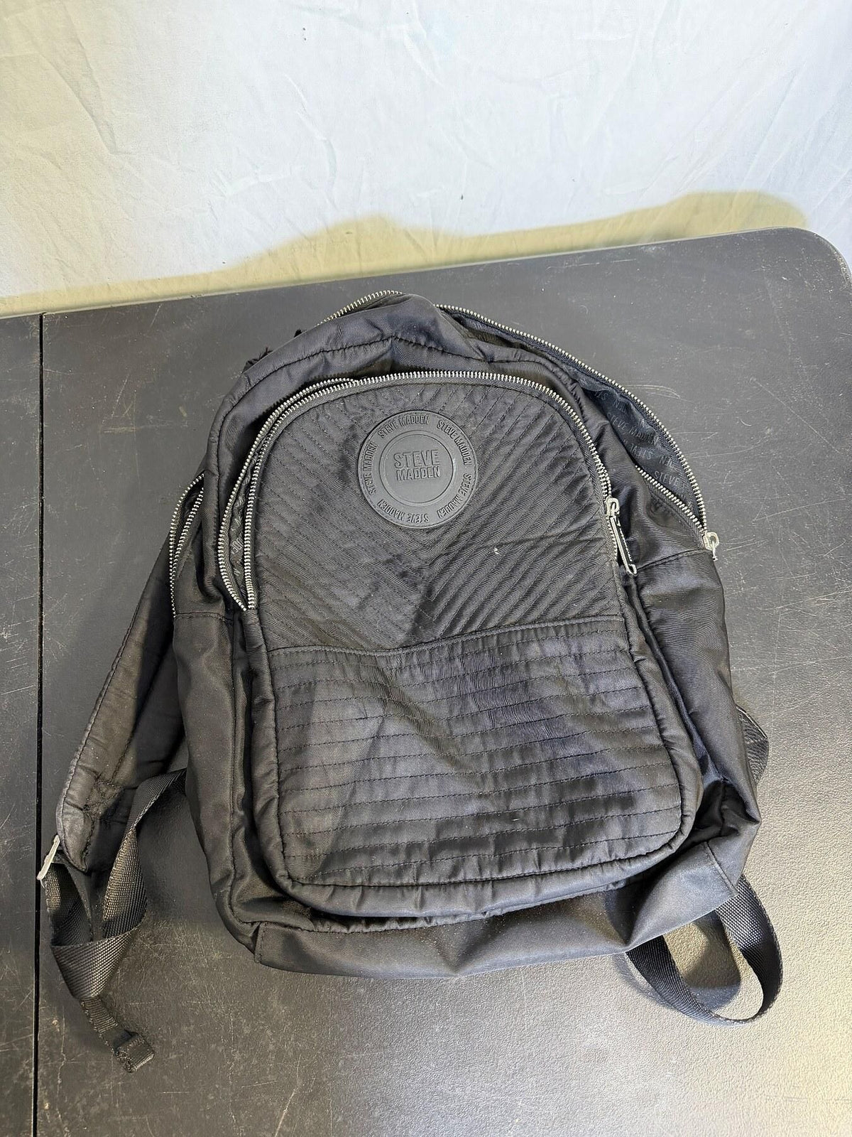 Steve Madden Black Quilted Mini Backpack with Logo Details - Wormhole Thrift