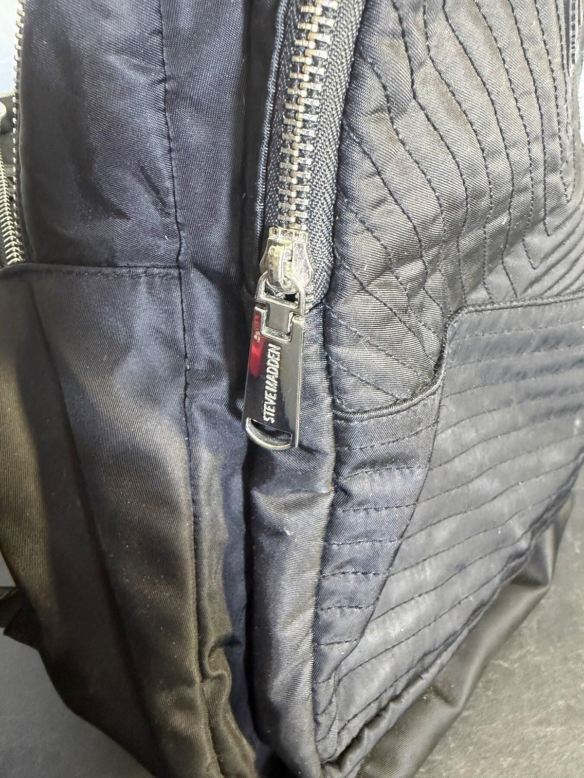 Steve Madden Black Quilted Mini Backpack with Logo Details - Wormhole Thrift