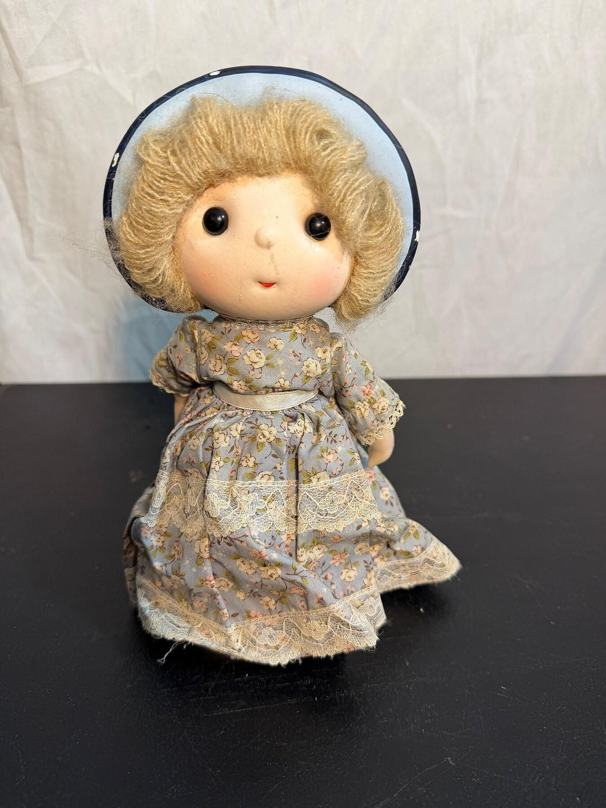 Vintage Bonnet Doll in Blue Floral Dress with Lace Trim - Wormhole Thrift