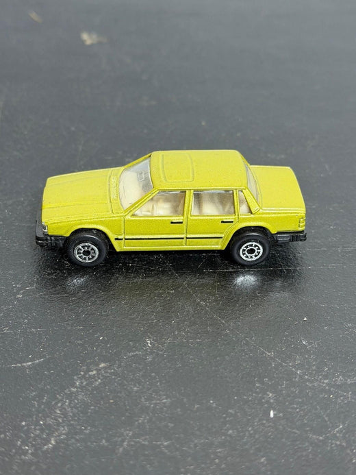 Vintage Maisto Volvo 760 GLE Yellow Diecast Car Sedan - Wormhole Thrift